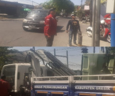 Dishub Gresik Gerak Cepat Perbaiki Lampu Lalu Lintas Mati di Perempatan Pasar Benjeng