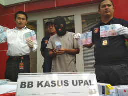 Polda Jatim Amankan Uang Palsu Produk Dampit Malang.