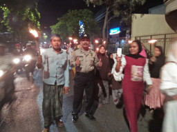 Polsek Semampir Kawal Kirab Pergantian Tahun Baru Islam.
