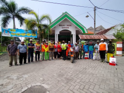 M. Lazin. SH. Kades Kemudi: Warga Jangan Panik, Tapi Tetap Waspada Terhadap Covid-19.