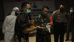 Tim Gabungan TNI-Polri di Gresik, Ikuti Pelatihan Pemulasaran Jenazah Covid-19. 