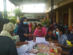 Terapkan Prokes, Penyaluran BNPT di Desa Tugu Sumberjo Berjalan Lancar dan Sukses