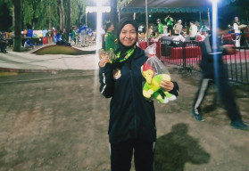 Triana Marta Sisilia Bawa Pulang Medali Perak dan Perunggu Cabor Petanque