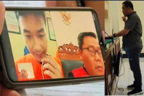 DUA TAHUN CANDU MAIN JUDI ONLINE JENIS E- SPORT DOTA, TERDAKWA MICHAEL DIADILI