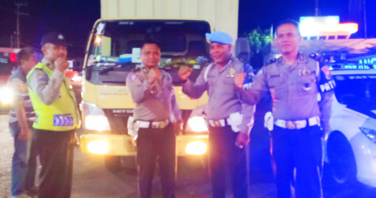 Polres Banyuwangi Sukses Kawal, Logistik Kotak Pemilu Untuk Kabupaten Bangli Provinsi Bali.